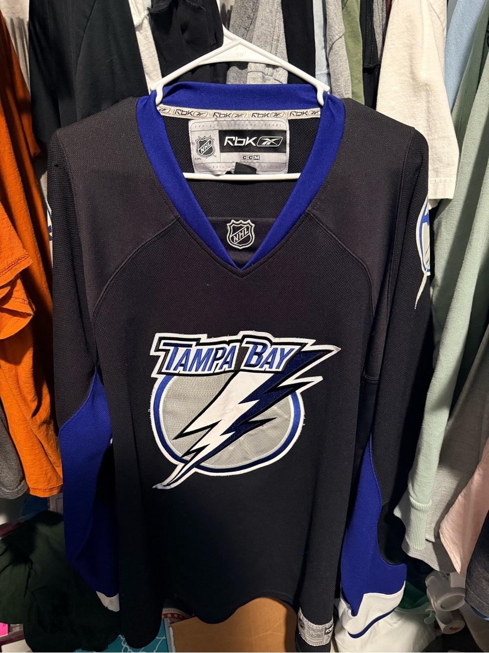 Reebok mens Tampa Bay Lightning Black and Blue Hockey Jersey